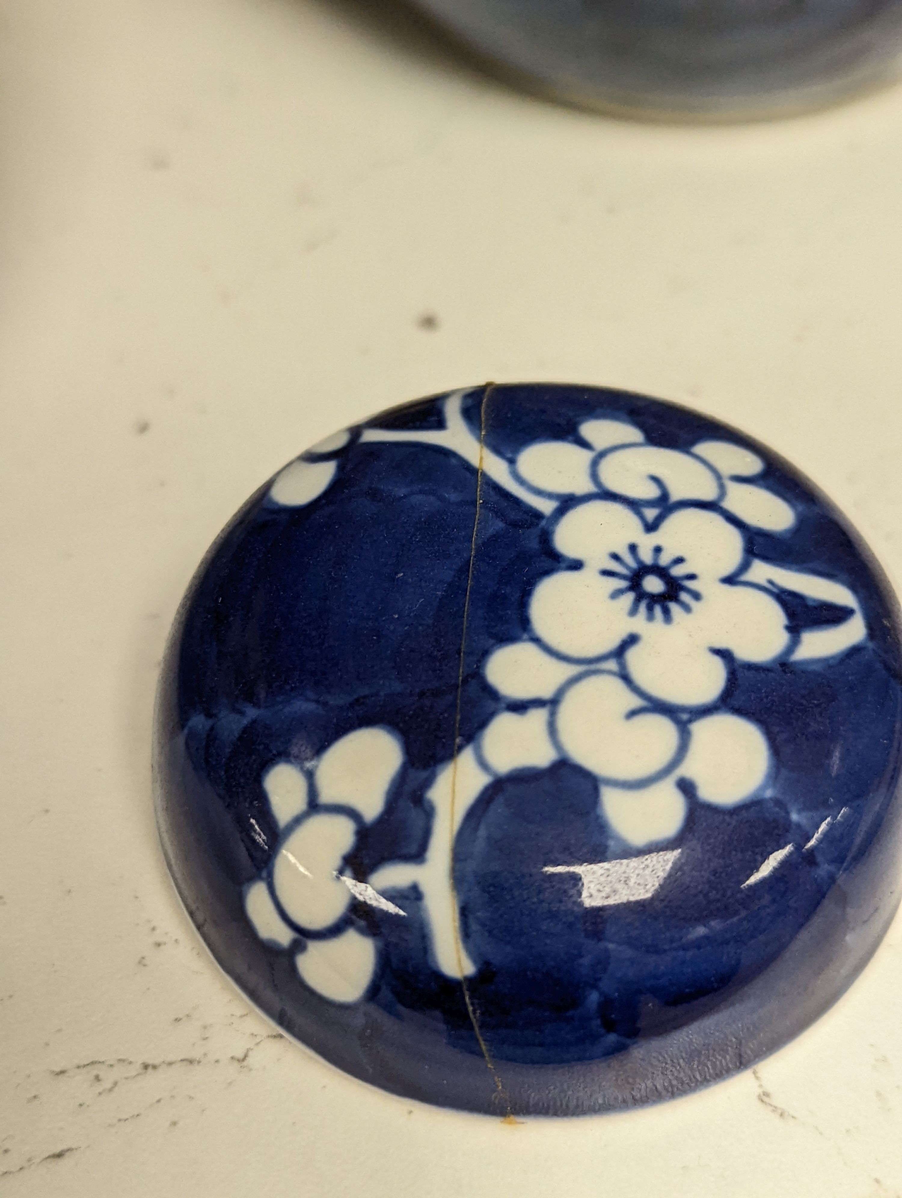 Three 19th century graduated Chinese blue and white ginger jars and covers